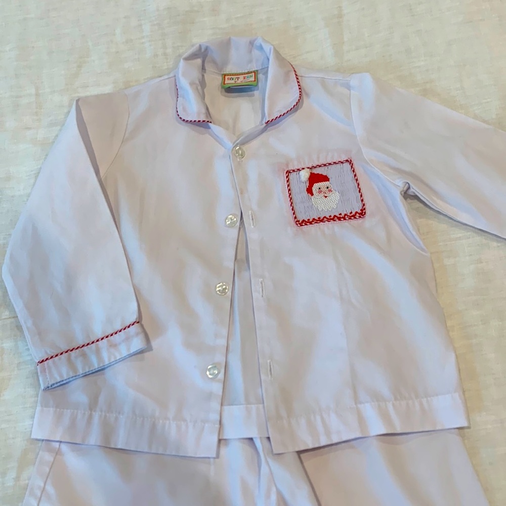 Boys smocked Christmas pajamas.